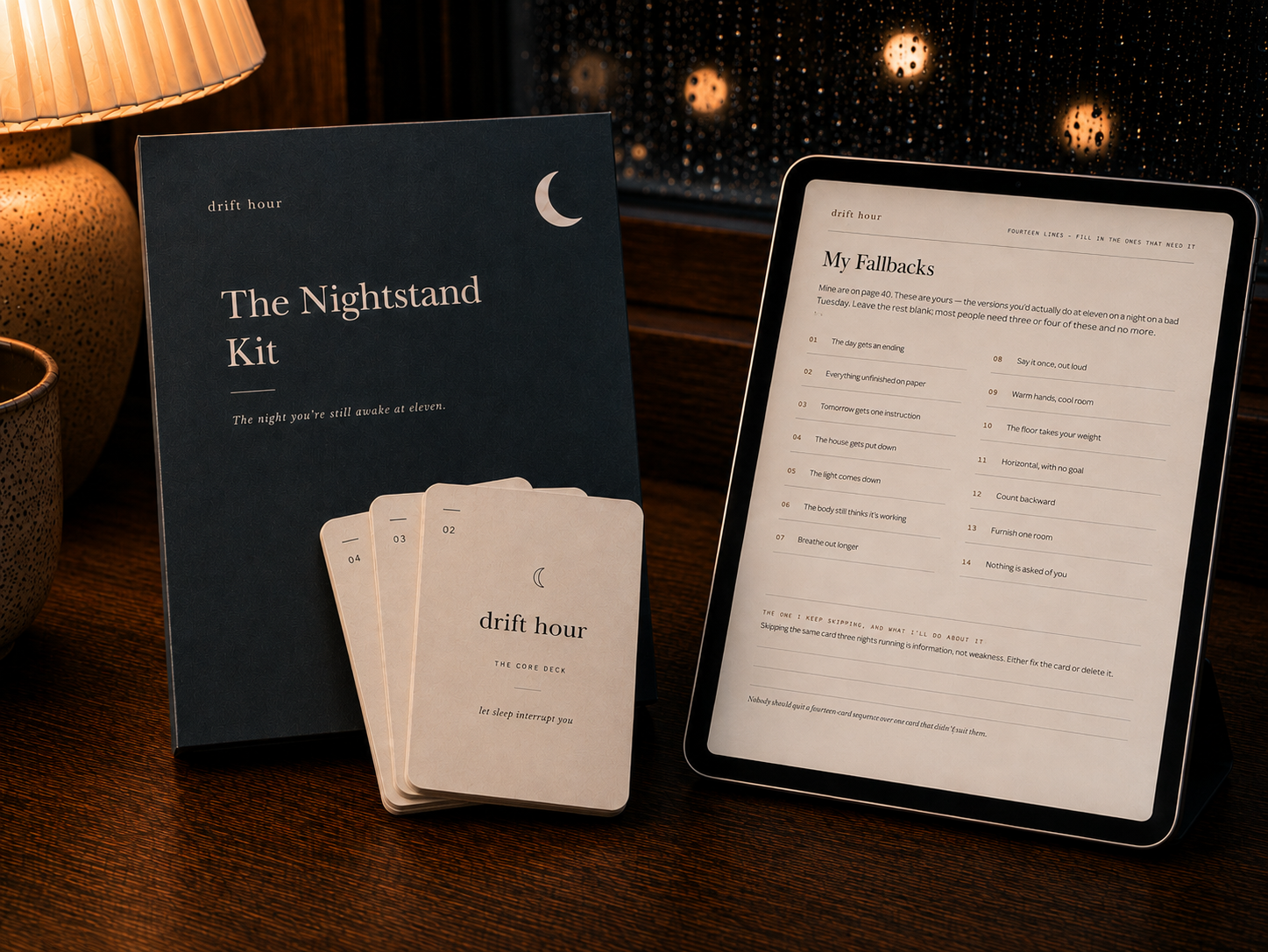 The Nightstand Kit system, its card deck and a fillable page on a tablet beside a lamp.