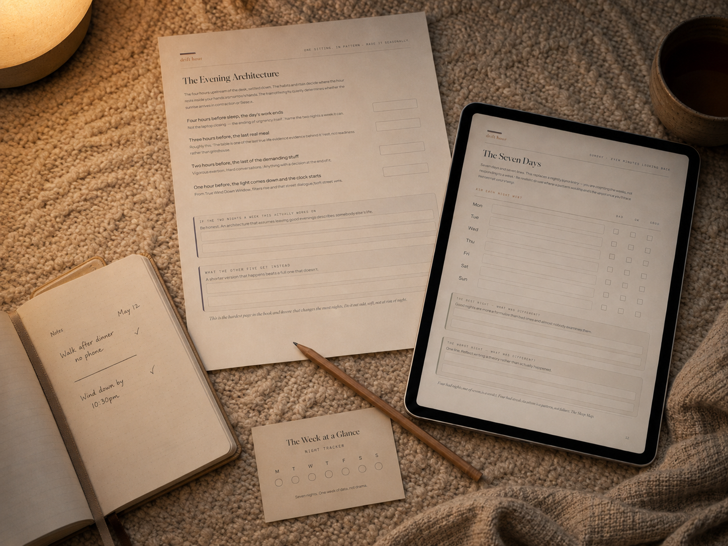 The Weekly Reset: the Evening Architecture sheet, the Seven Days page on a tablet, and a week tracker card